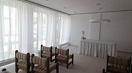 Curtains and a tablecloth with a skirt for the ceremonial room in the village of Lešná