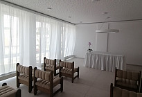 Curtains and a tablecloth with a skirt for the ceremonial room in the village of Lešná