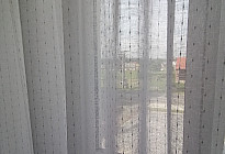 Curtains and a tablecloth with a skirt for the ceremonial room in the village of Lešná