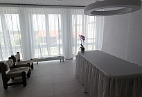 Curtains and a tablecloth with a skirt for the ceremonial room in the village of Lešná